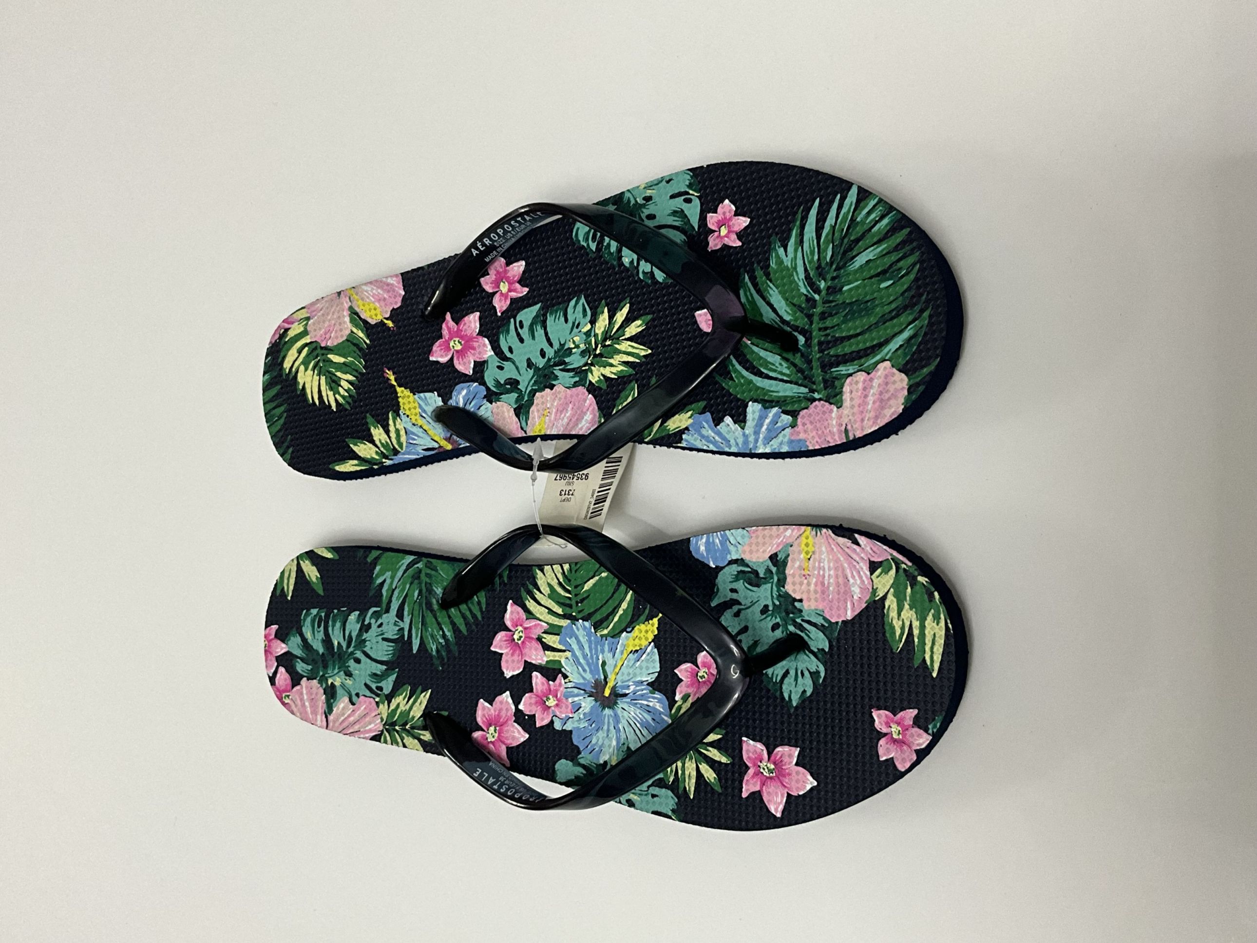 Sandalia azul con flores