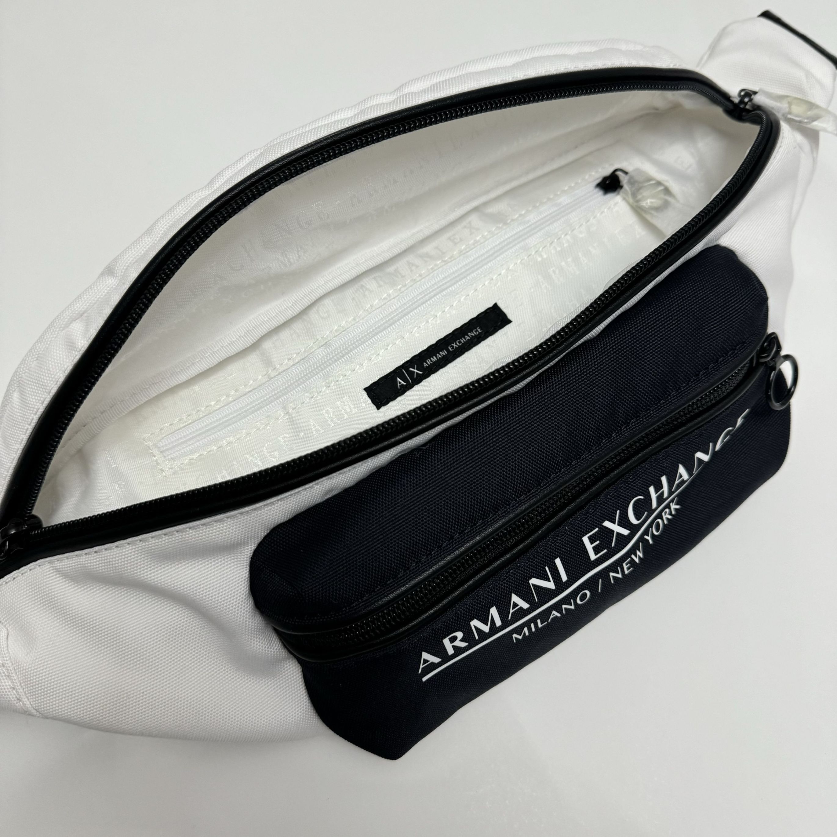 ax001-cangurera blanco con azul-  